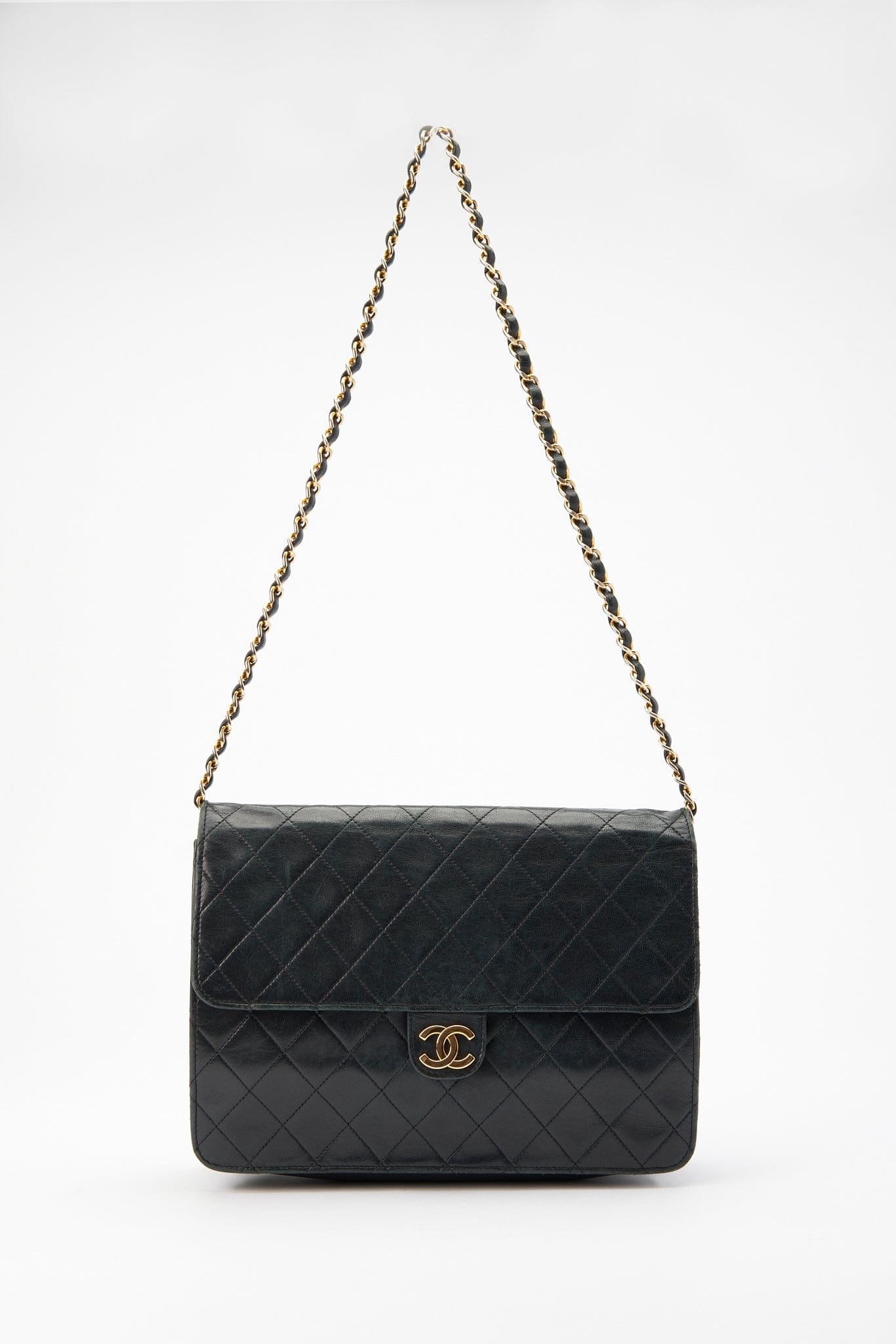 Vintage Black Chanel Flap Bag with 24K Plated Hardware