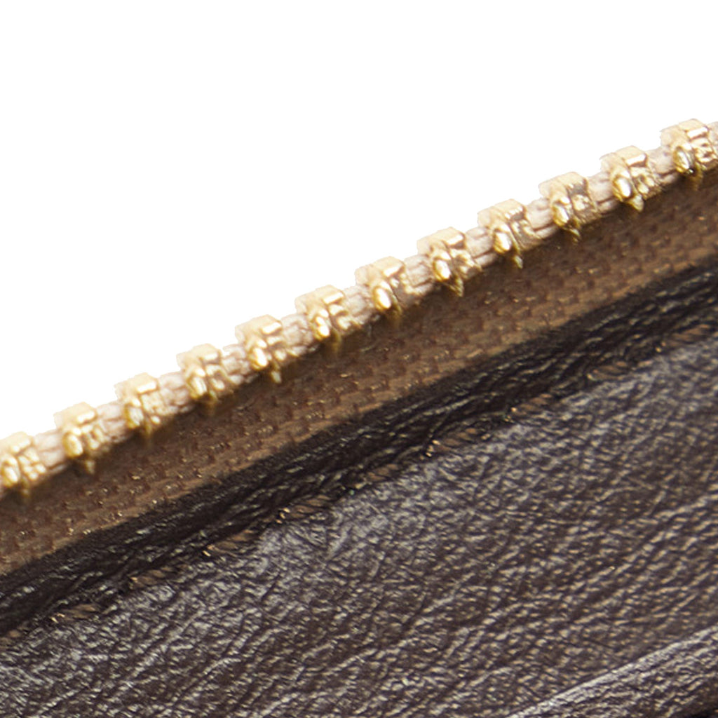 Brown Louis Vuitton Taurillon Comete Wallet