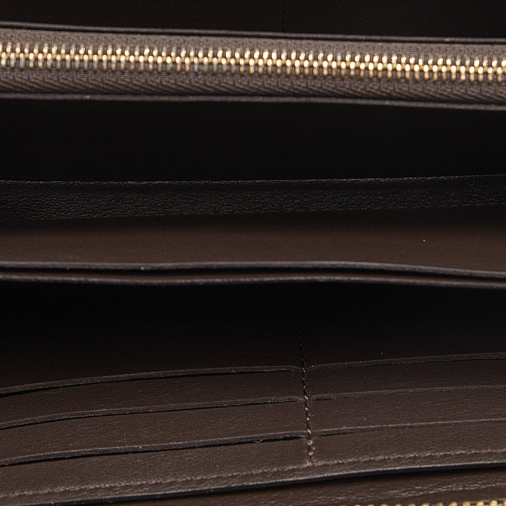 Brown Louis Vuitton Taurillon Comete Wallet