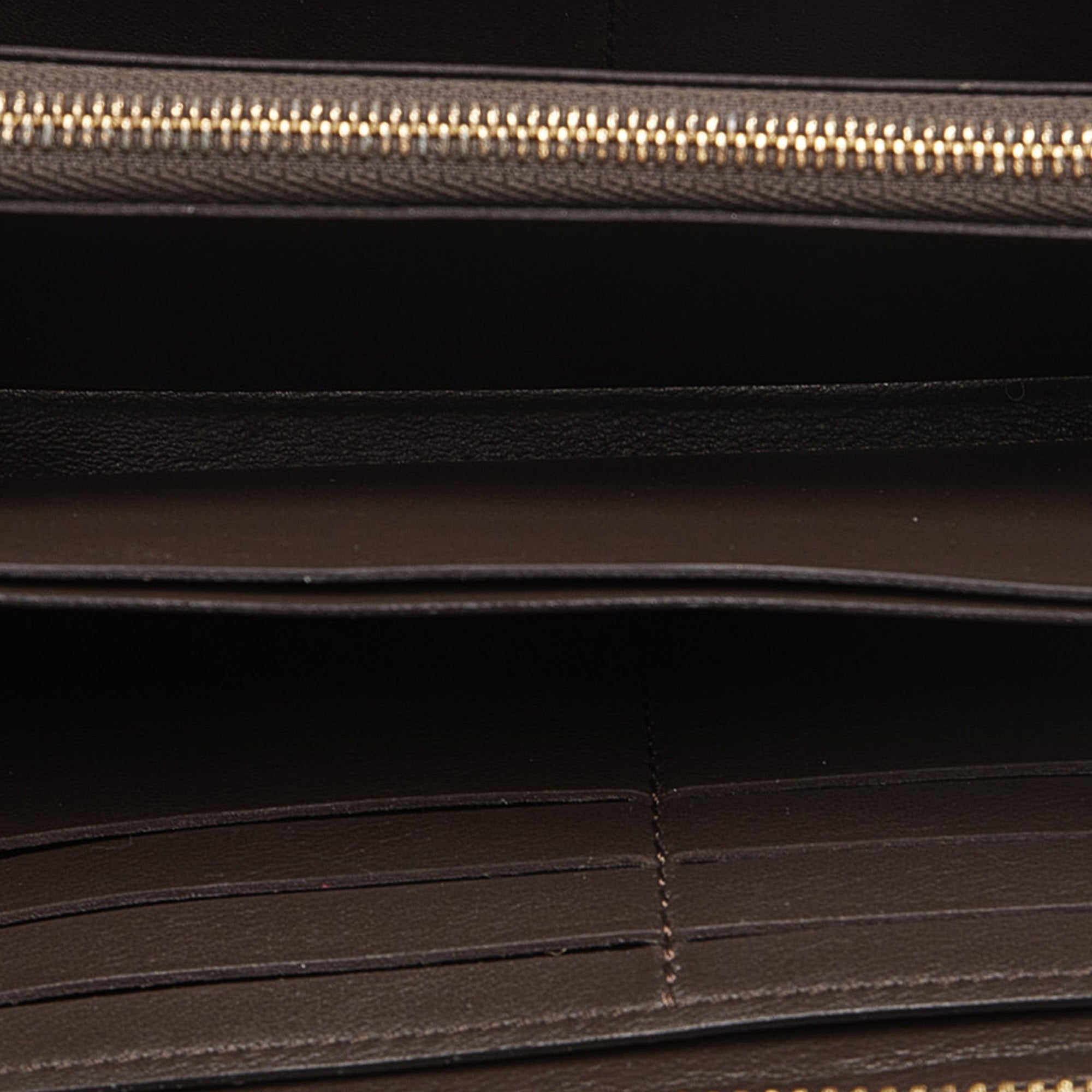 Brown Louis Vuitton Taurillon Comete Wallet