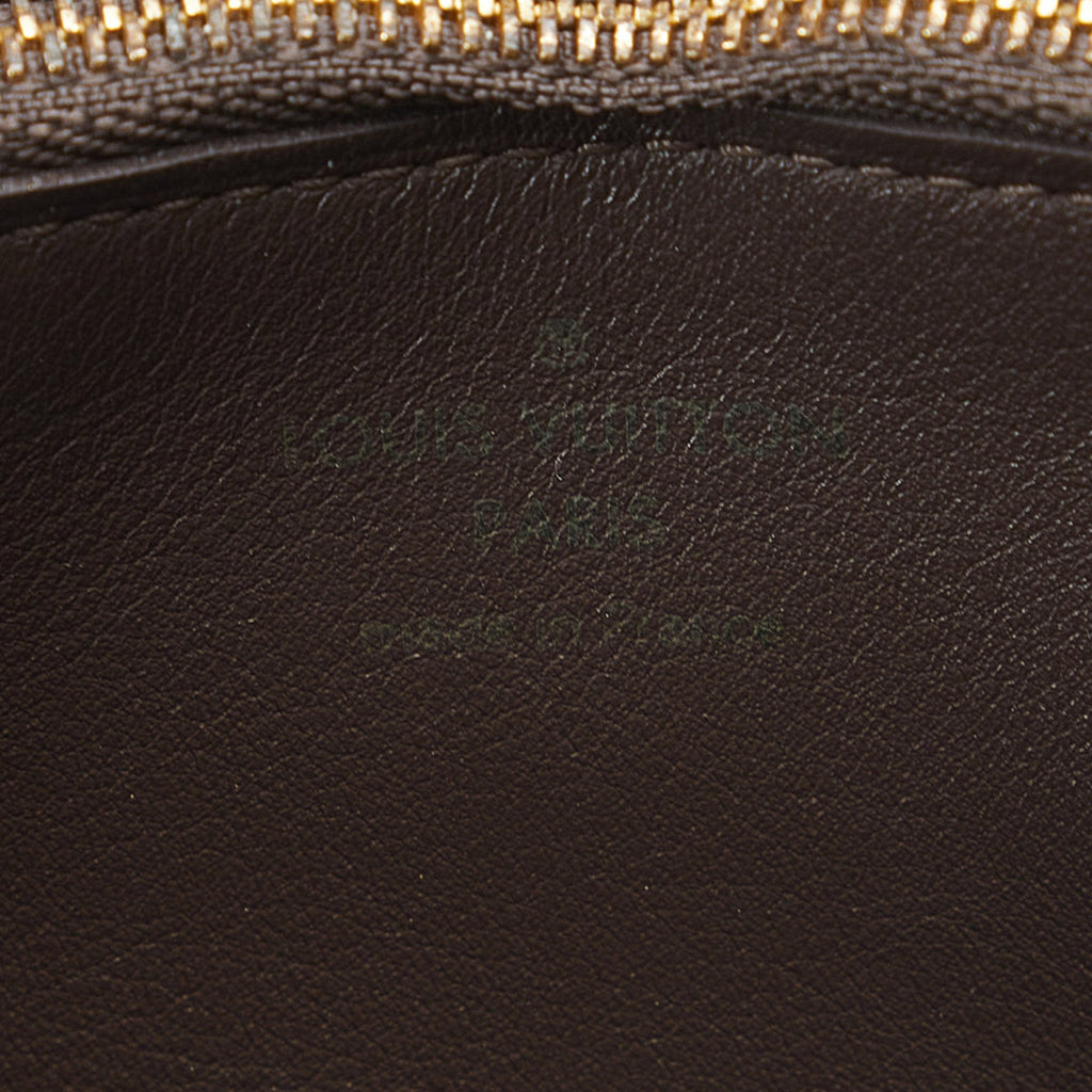Brown Louis Vuitton Taurillon Comete Wallet