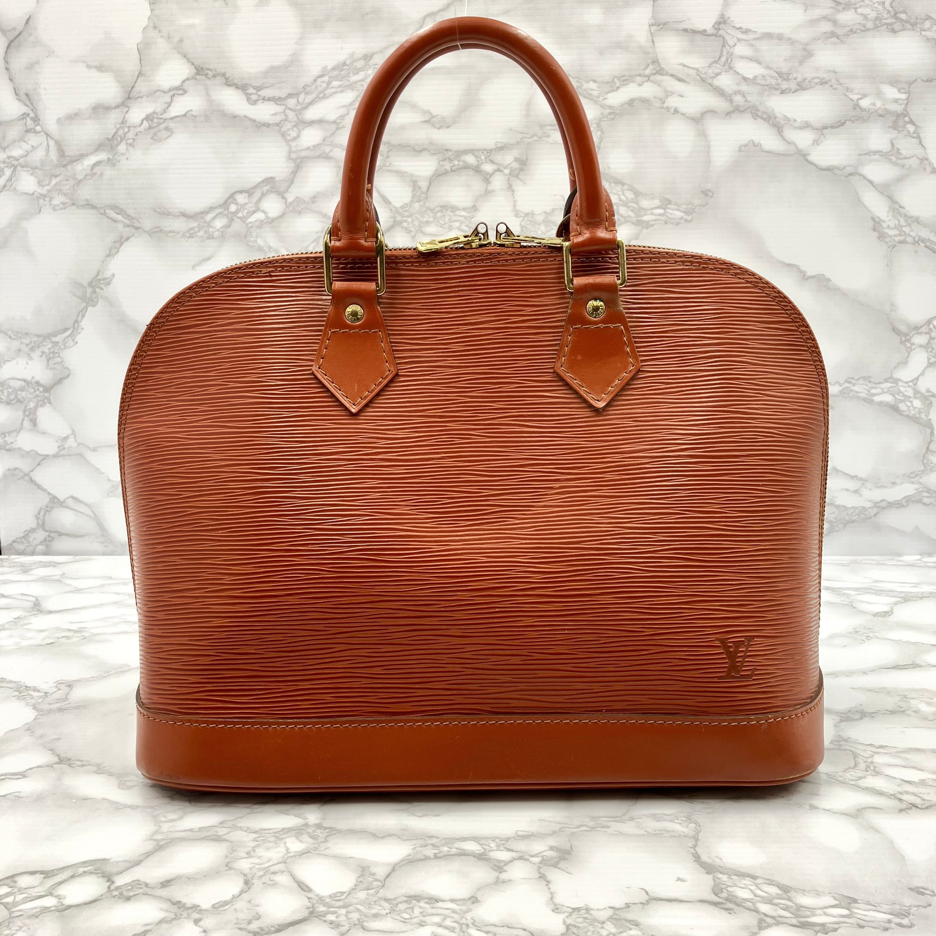 LOUIS VUITTON Epi Alma PM