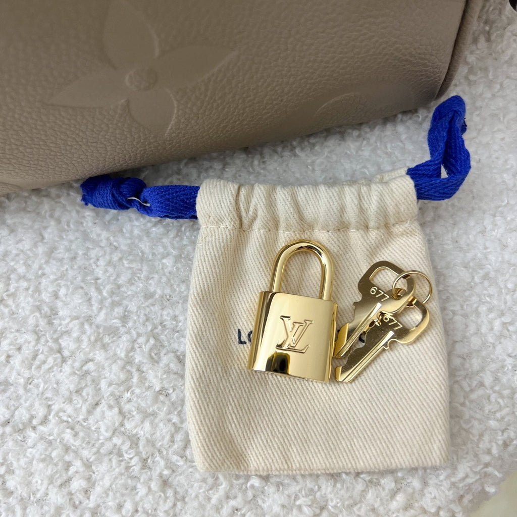 LV Speedy 25 Bandouliere in Tourterelle Giant Monogram Empreinte Leather GHW