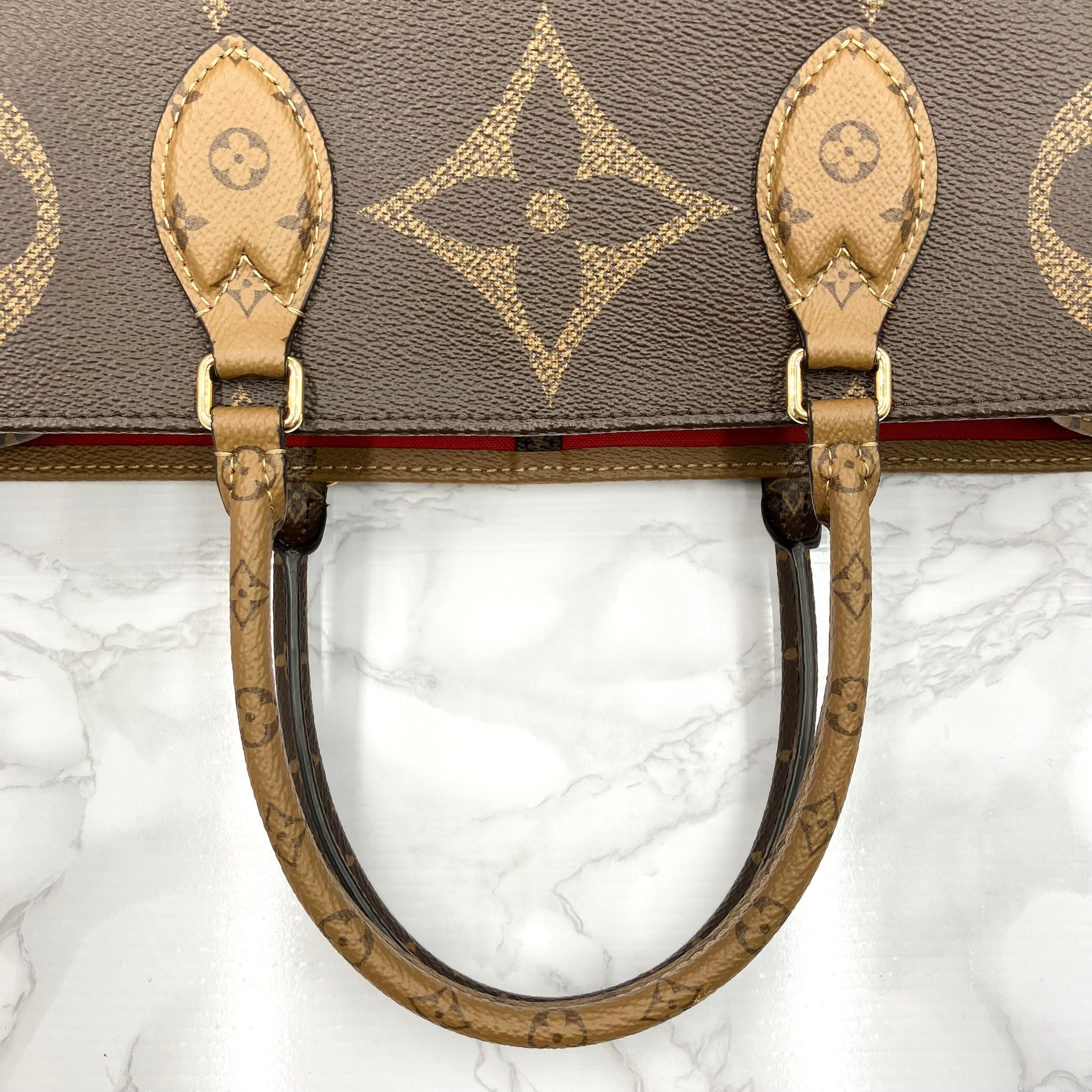 LOUIS VUITTON On The Go GM Monogram Giant Reverse