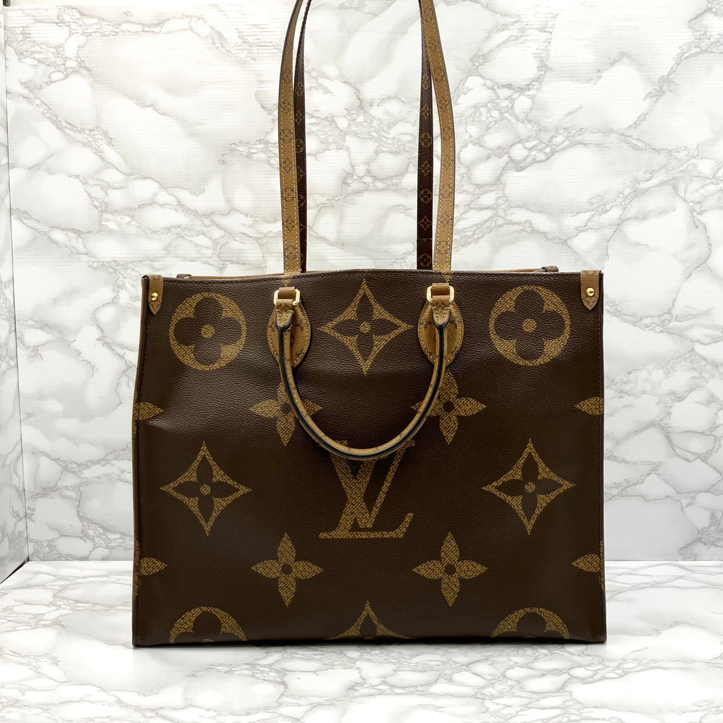 LOUIS VUITTON On The Go GM Monogram Giant Reverse