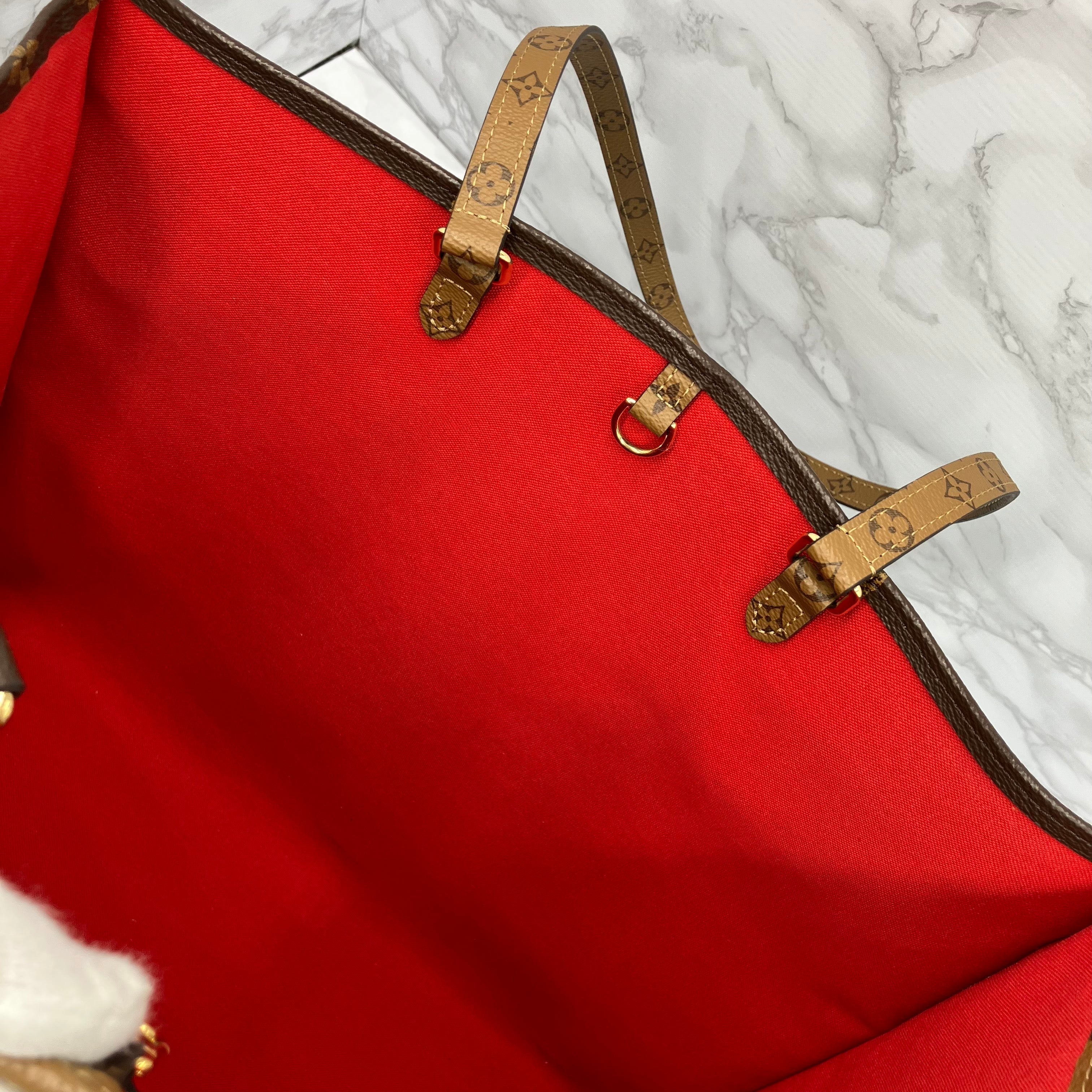 LOUIS VUITTON On The Go GM Monogram Giant Reverse