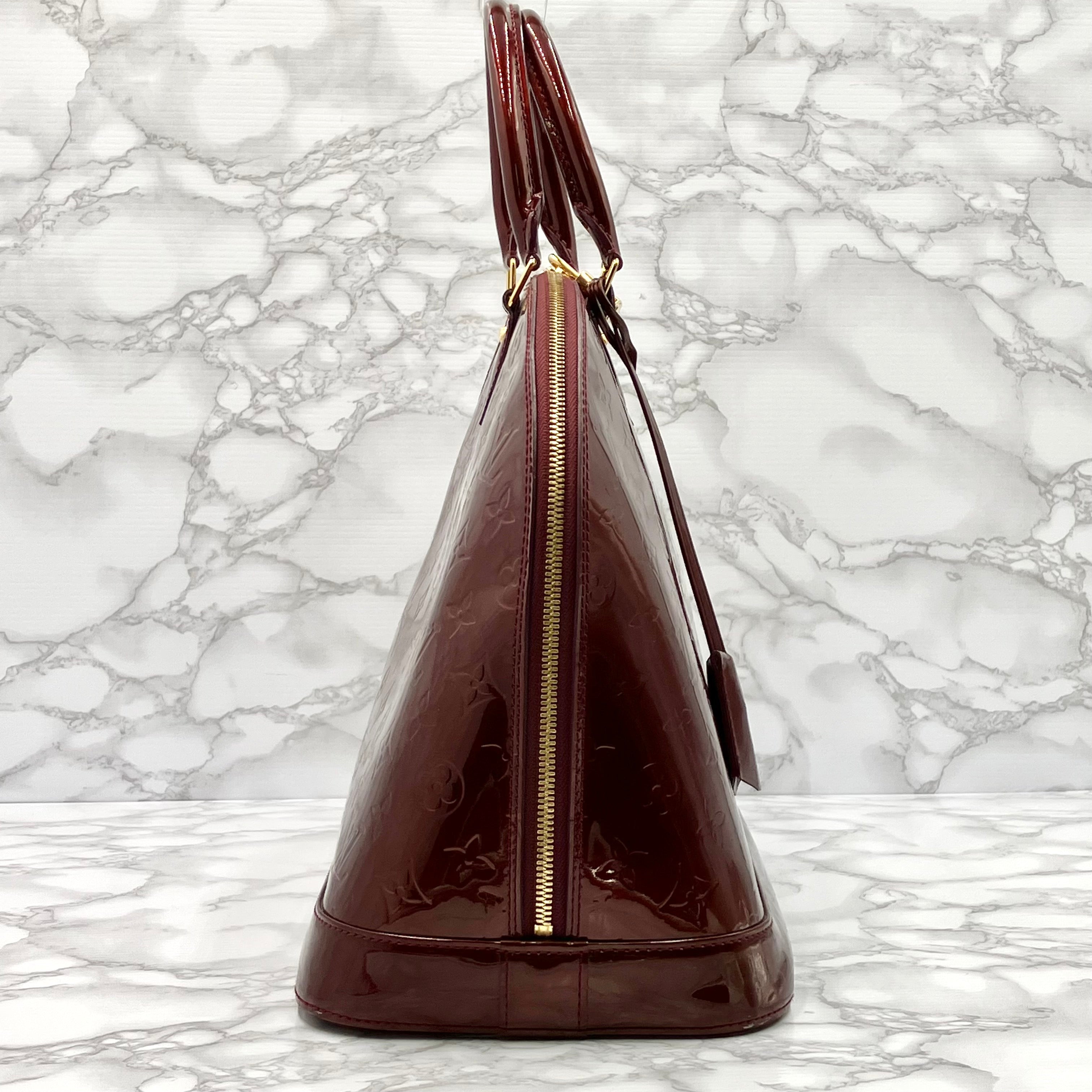 LOUIS VUITTON Vernis Alma MM