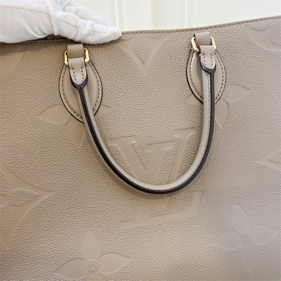 LV Onthego MM in Tourterelle Empreinte Leather and GHW