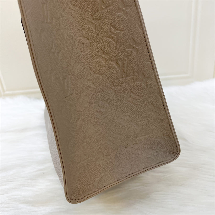 LV Onthego MM in Tourterelle Empreinte Leather and GHW