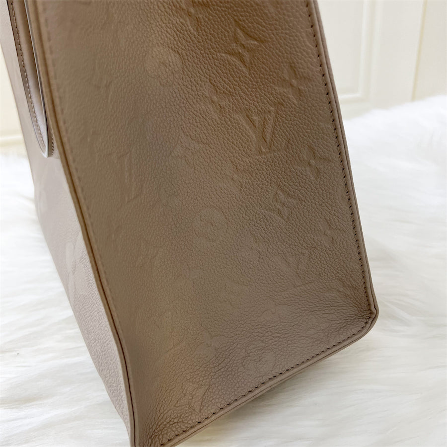 LV Onthego MM in Tourterelle Empreinte Leather and GHW