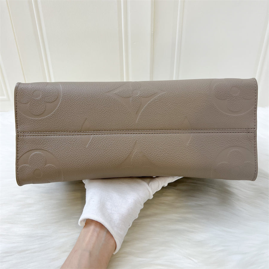 LV Onthego MM in Tourterelle Empreinte Leather and GHW