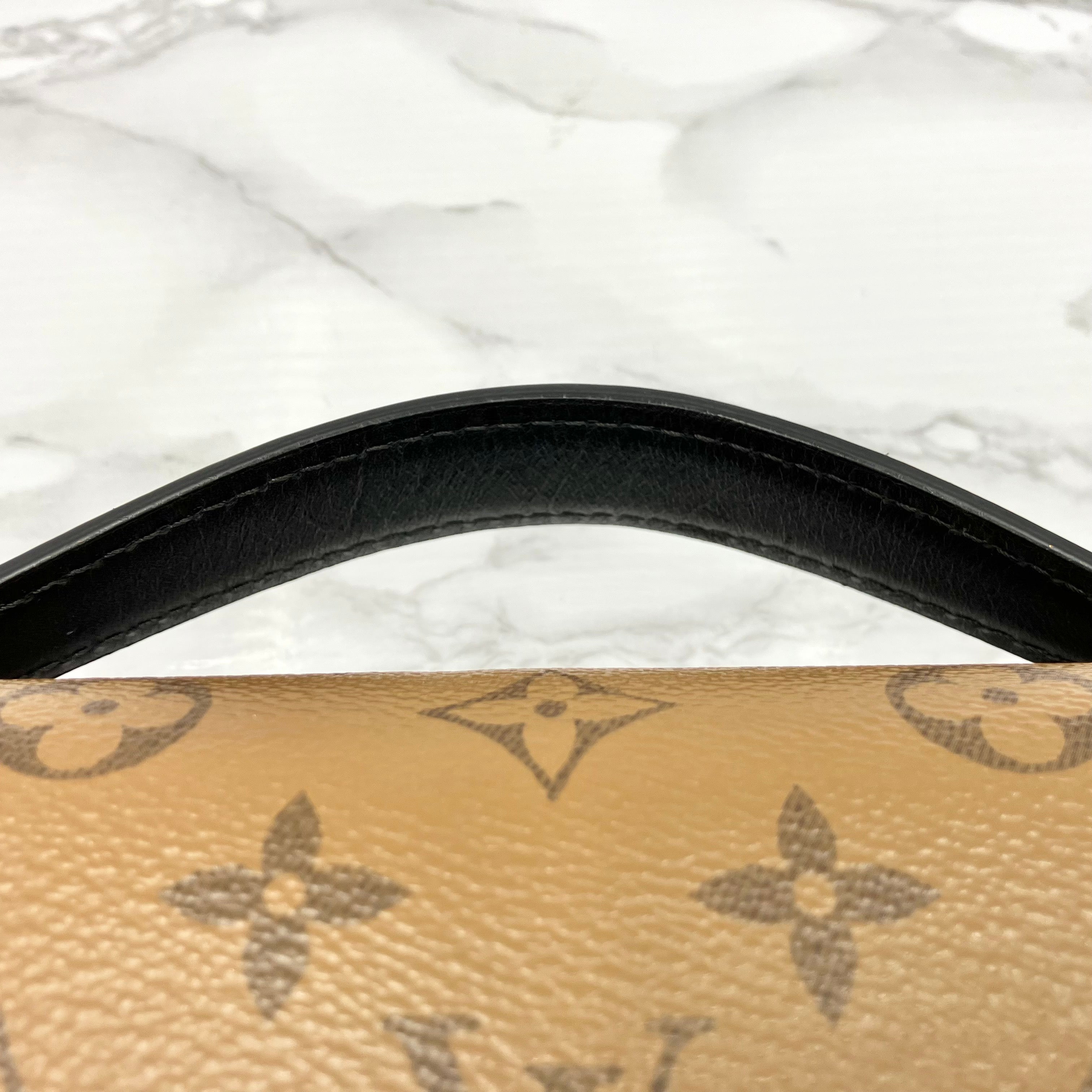 LOUIS VUITTON Monogram Reverse Metis