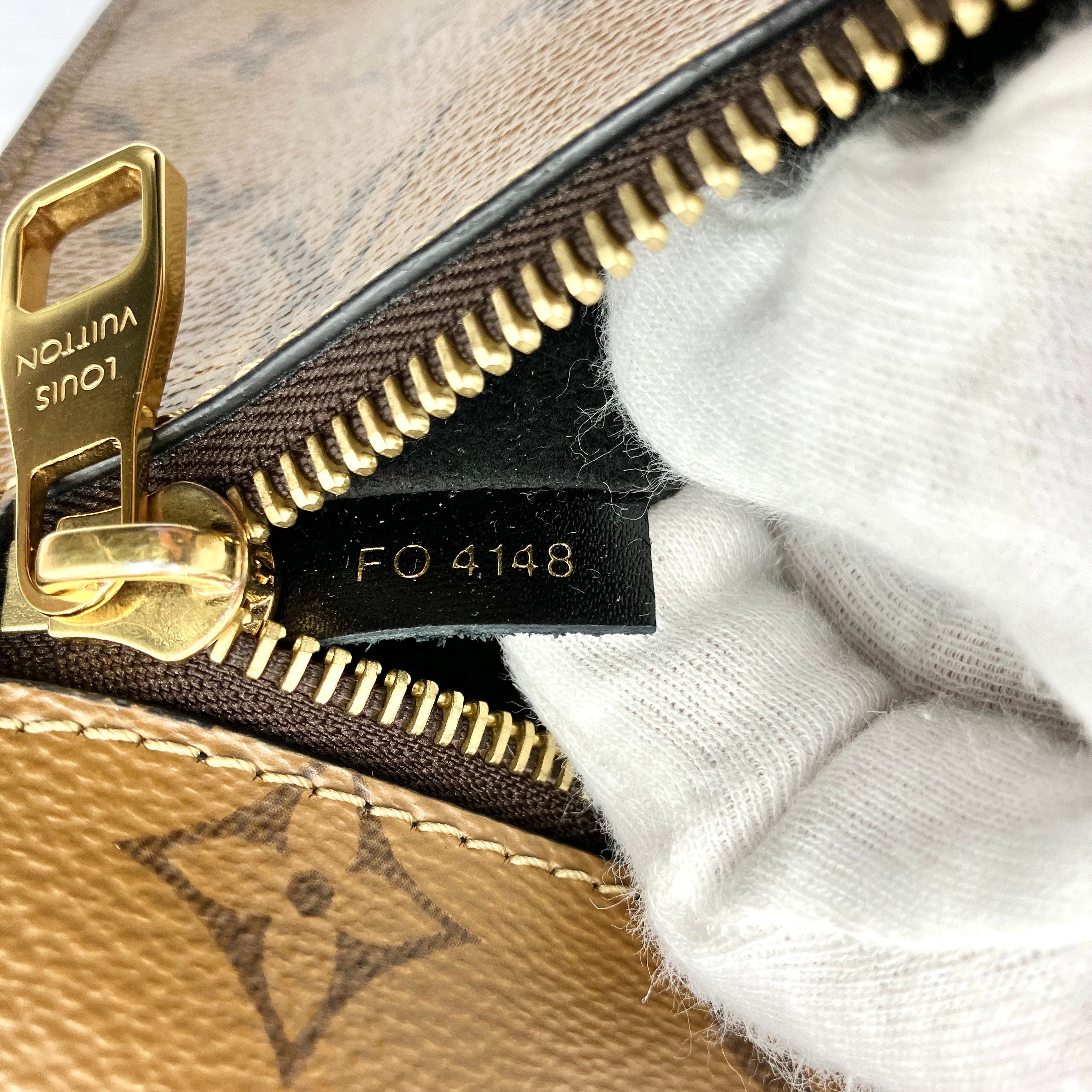 LOUIS VUITTON Monogram Reverse Metis