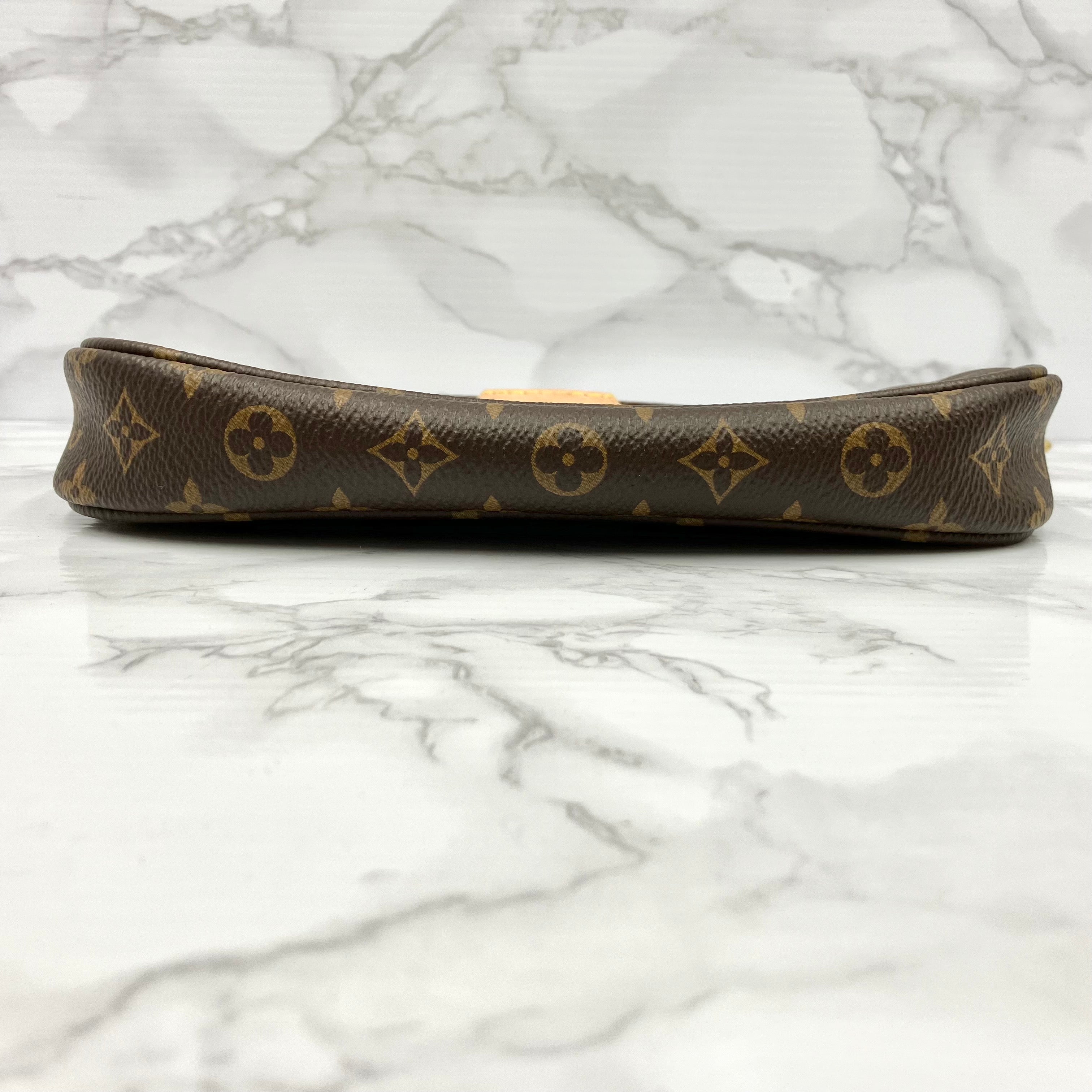 LOUIS VUITTON Monogram Mürti Pochette