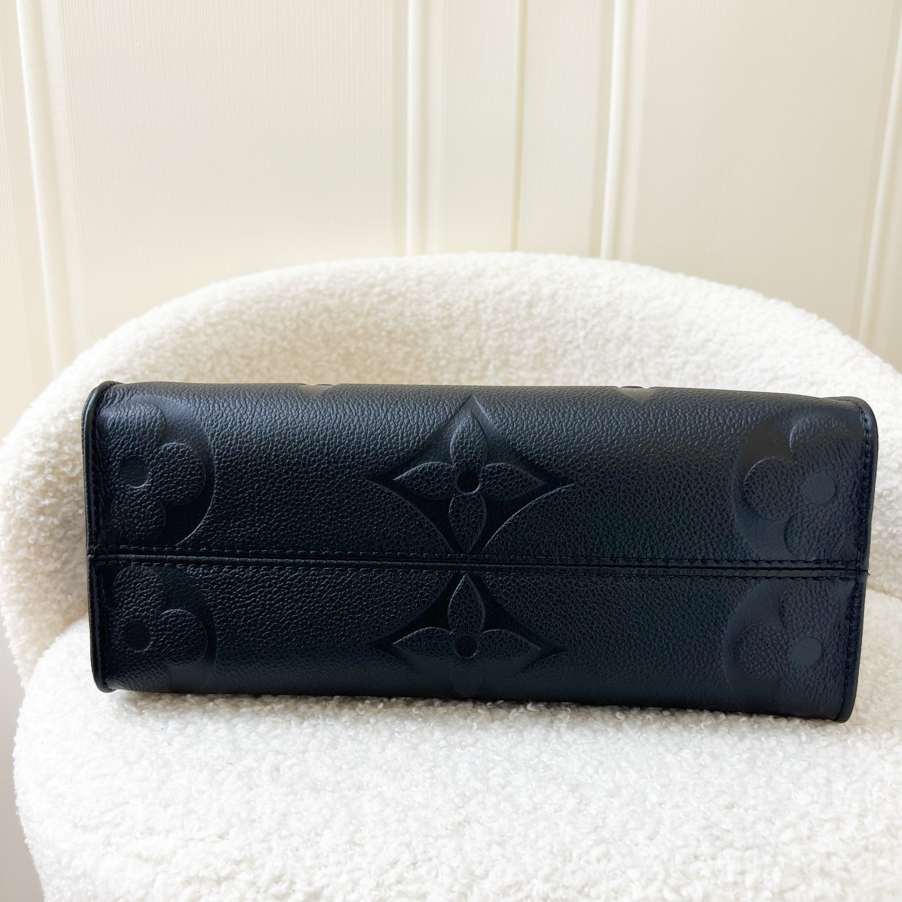 LV Onthego PM in Black Giant Monogram Empreinte Leather GHW