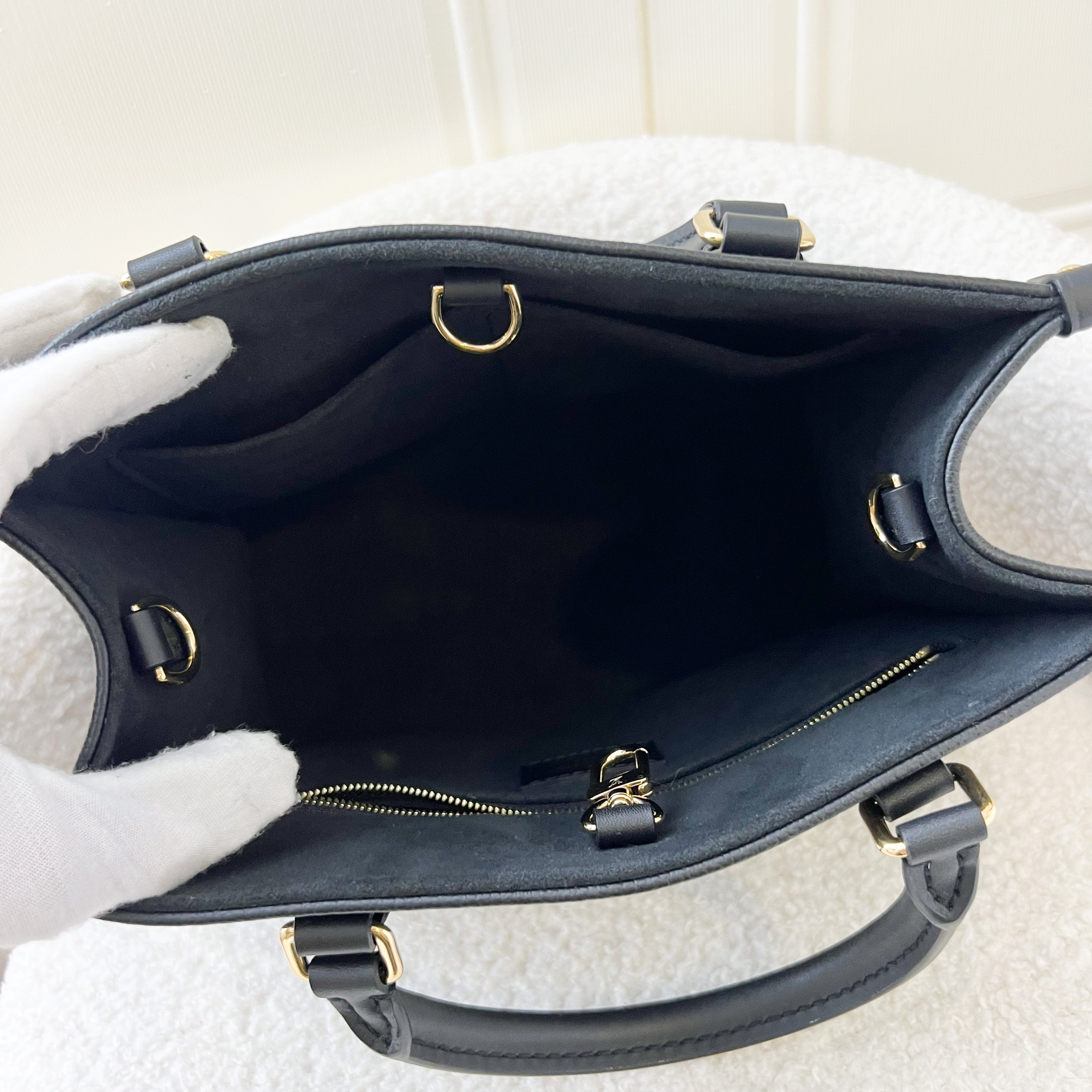 LV Onthego PM in Black Giant Monogram Empreinte Leather GHW