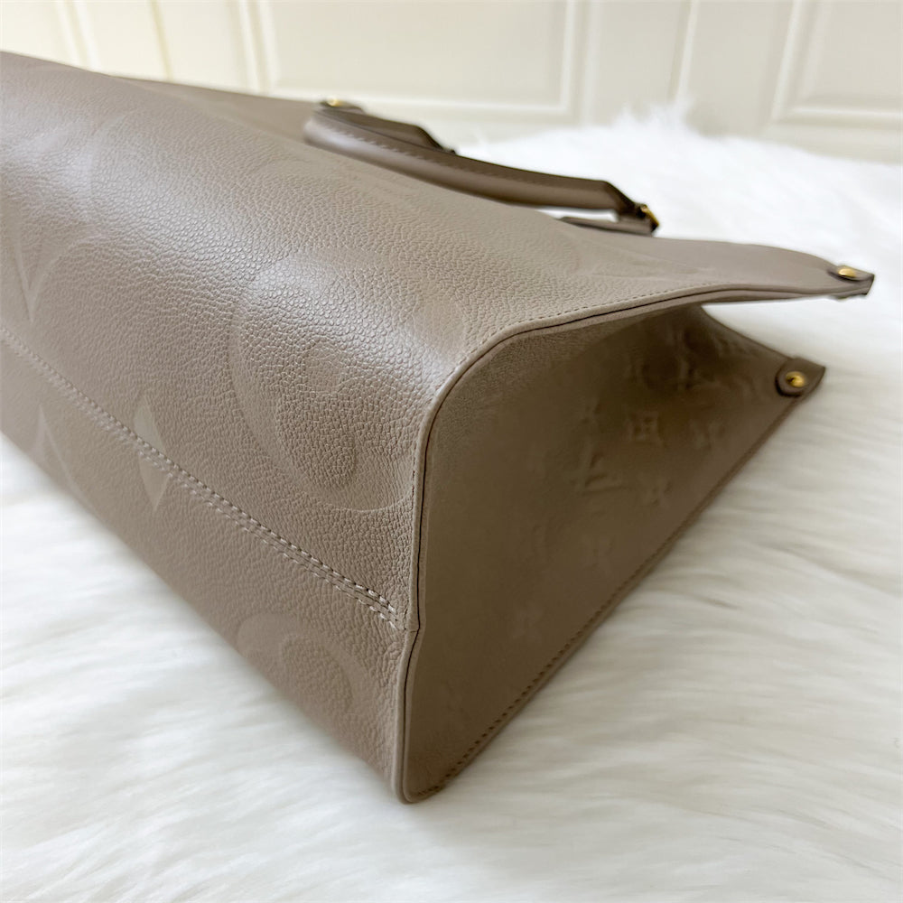 LV Onthego MM in Tourterelle Giant Monogram Empreinte Leather GHW