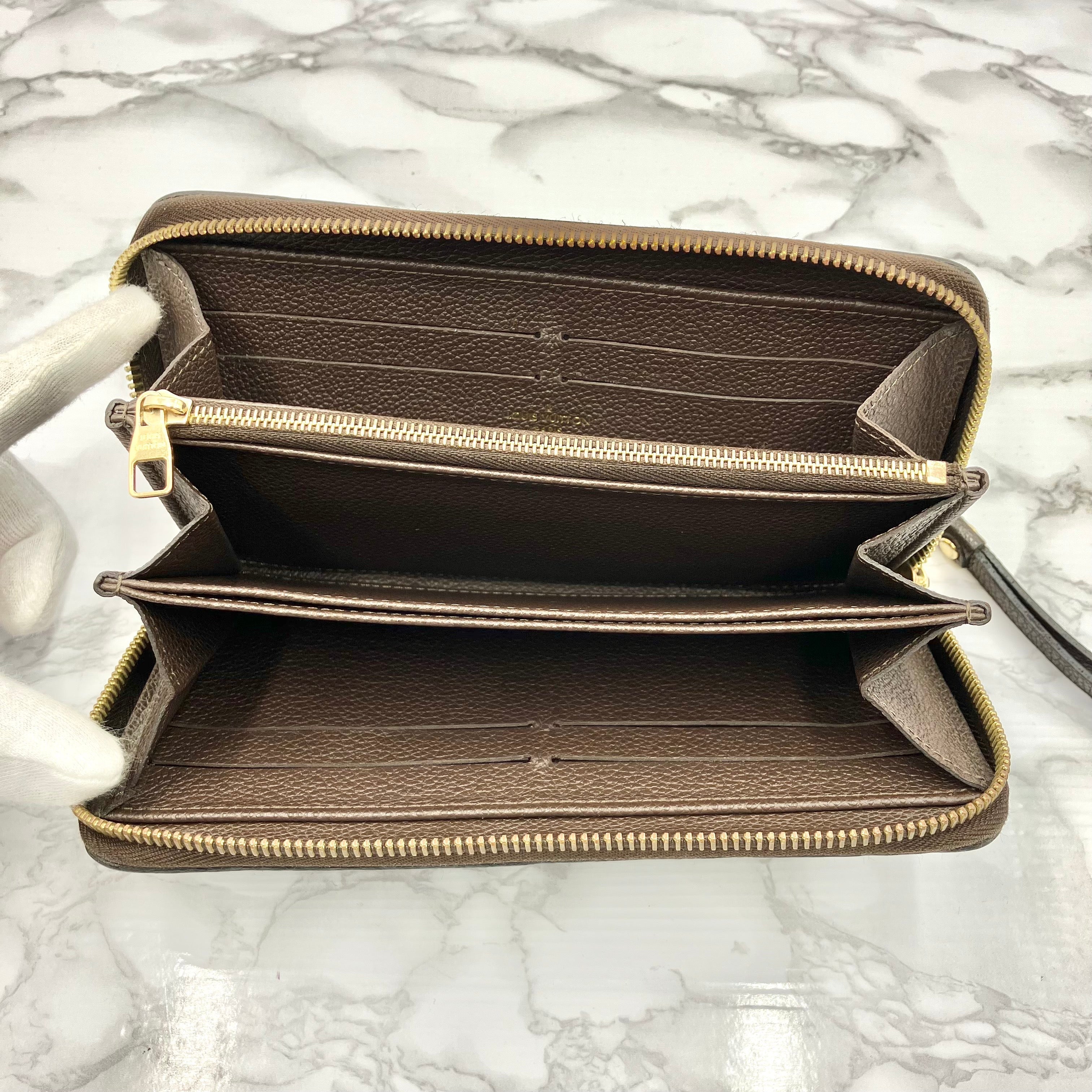 LOUIS VUITTON Amplant Zippy
