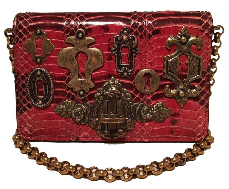 Dolce and Gabbana Maroon Snakeskin Keyhole Clutch Bag