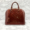 LOUIS VUITTON Vernis Alma PM