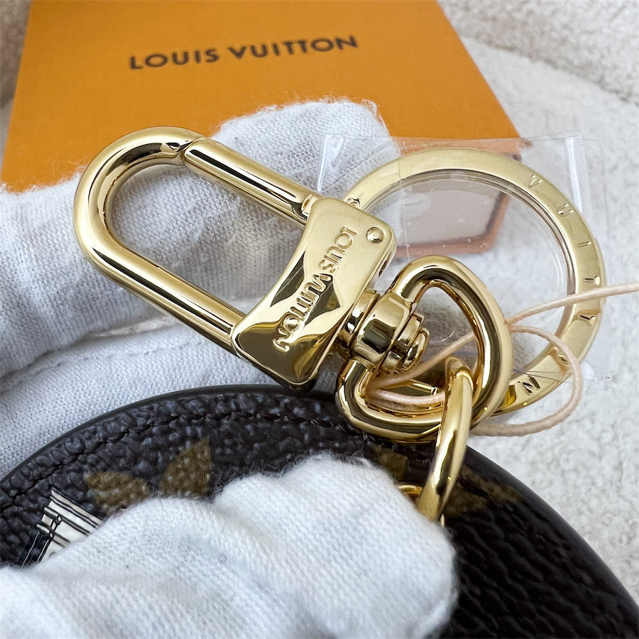 LV Christmas Animation 2022 New York Round Bag Charm in Monogram Canvas GHW