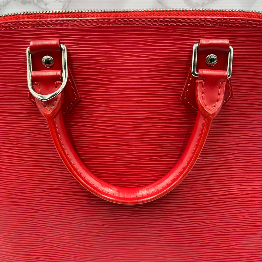 LOUIS VUITTON Epi Alma PM Handbag