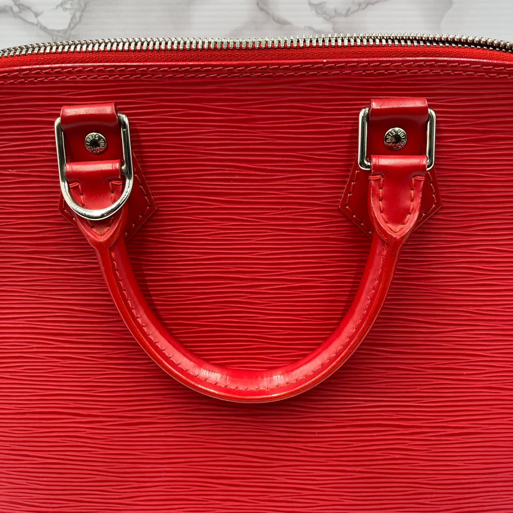 LOUIS VUITTON Epi Alma PM Handbag