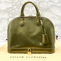 LOUIS VUITTON Vernis Alma handbag