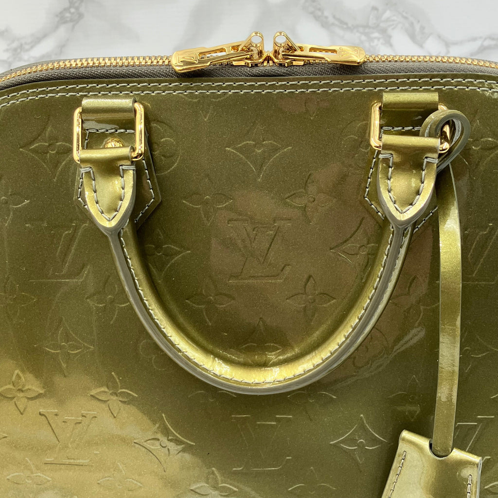 LOUIS VUITTON Vernis Alma handbag