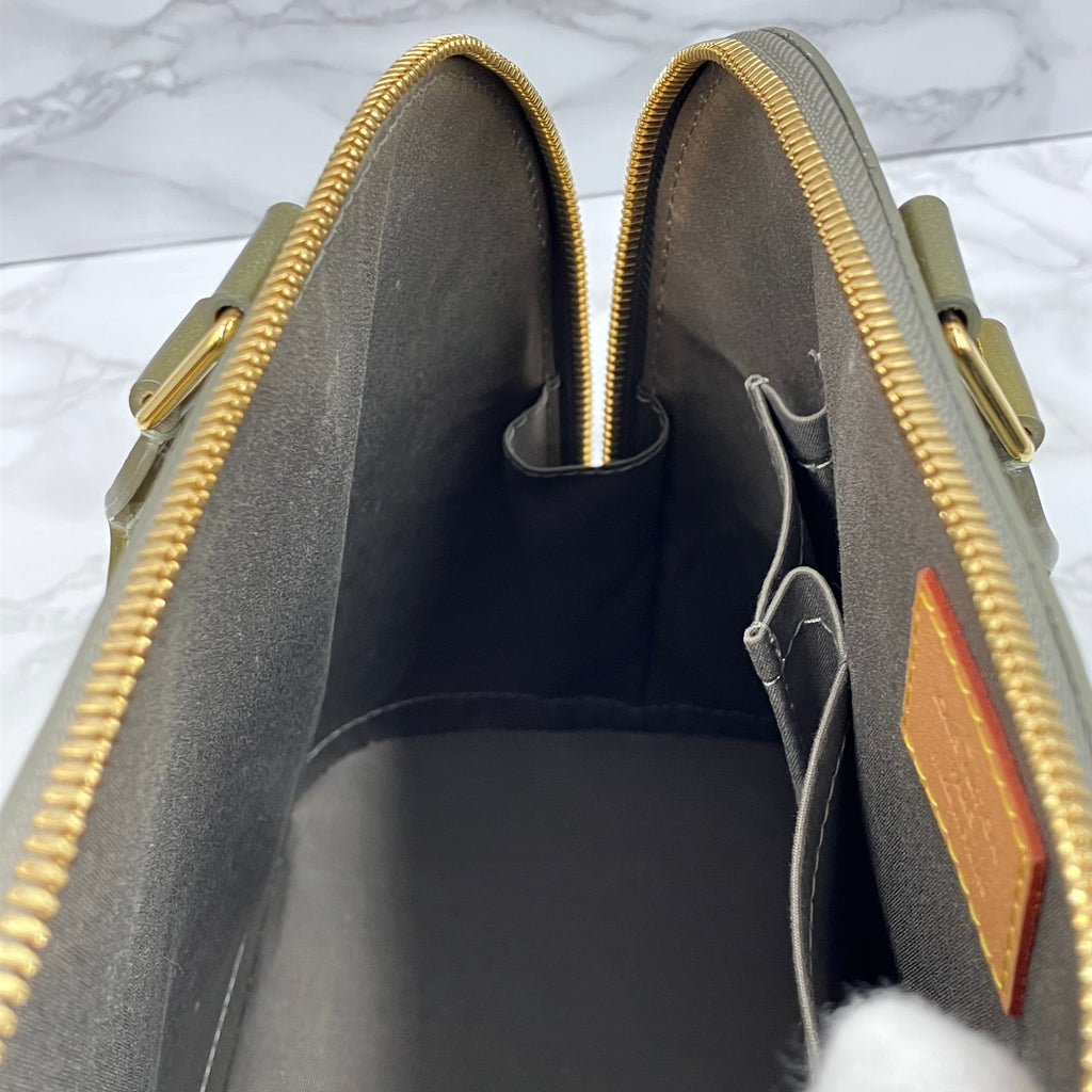 LOUIS VUITTON Vernis Alma handbag