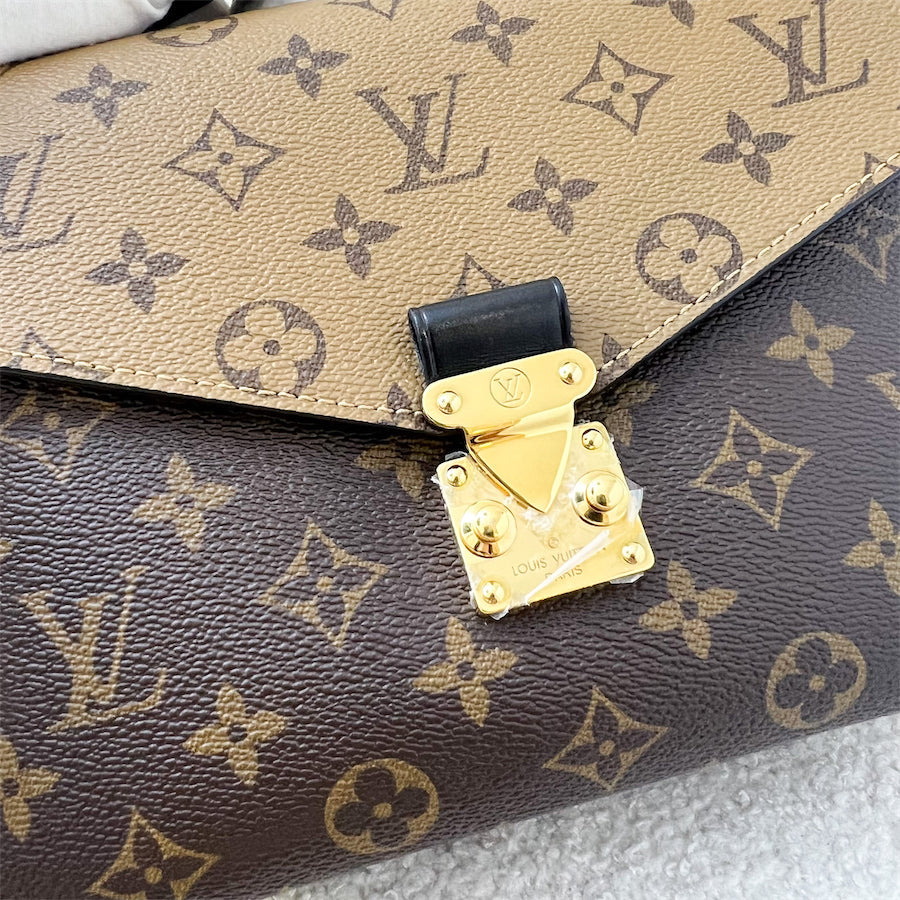 LV Pochette Metis in Reverse Monogram Canvas, Black Leather and GHW