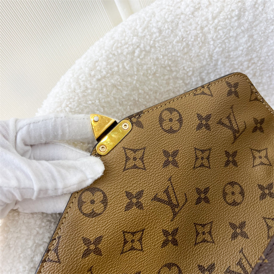 LV Pochette Metis in Reverse Monogram Canvas, Black Leather and GHW
