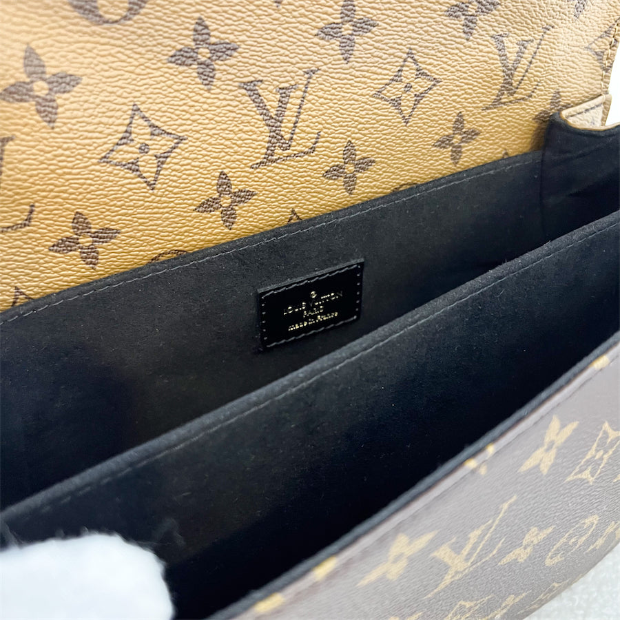 LV Pochette Metis in Reverse Monogram Canvas, Black Leather and GHW