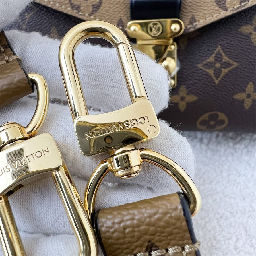 LV Pochette Metis in Reverse Monogram Canvas, Black Leather and GHW