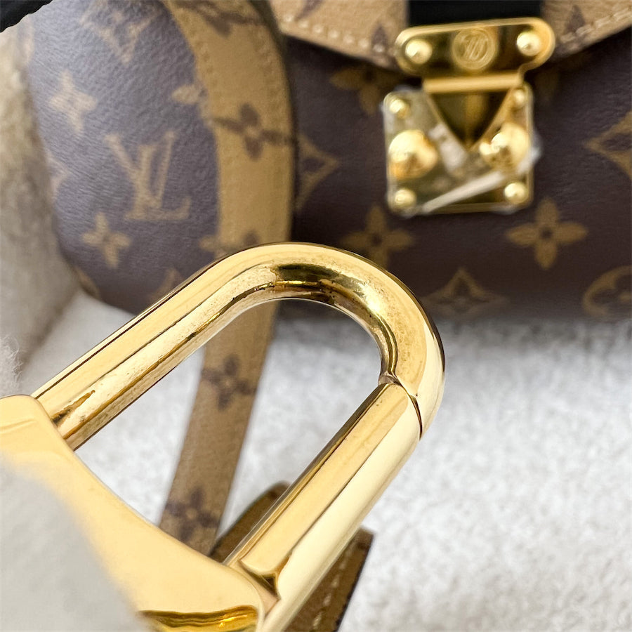 LV Pochette Metis in Reverse Monogram Canvas, Black Leather and GHW