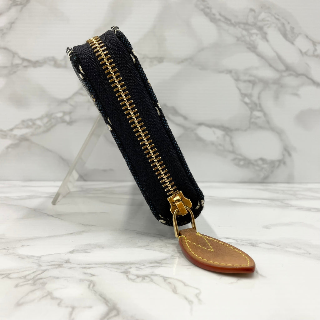 LOUIS VUITTON 1854 Zippy Wallet