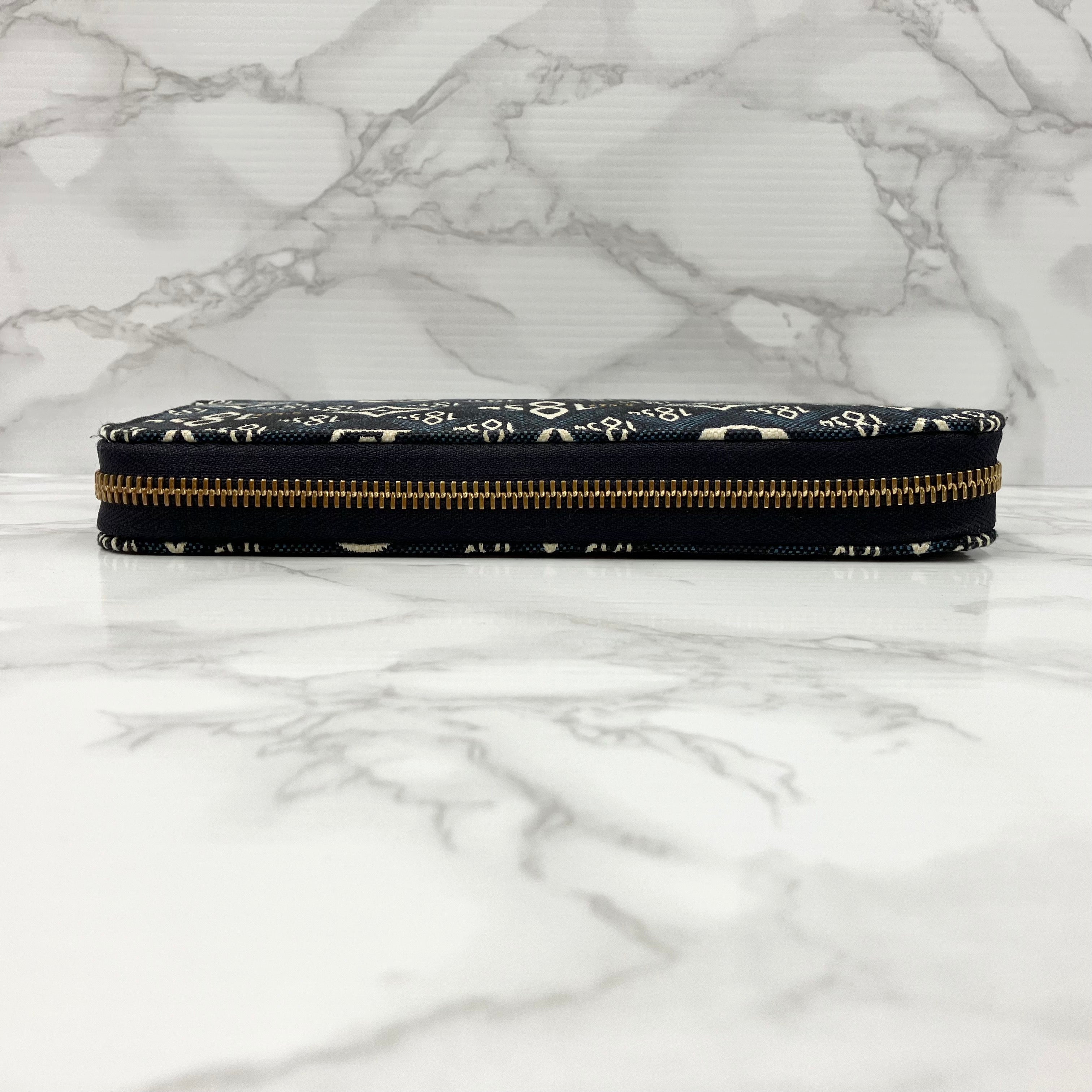 LOUIS VUITTON 1854 Zippy Wallet
