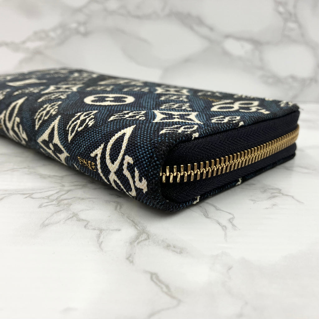 LOUIS VUITTON 1854 Zippy Wallet