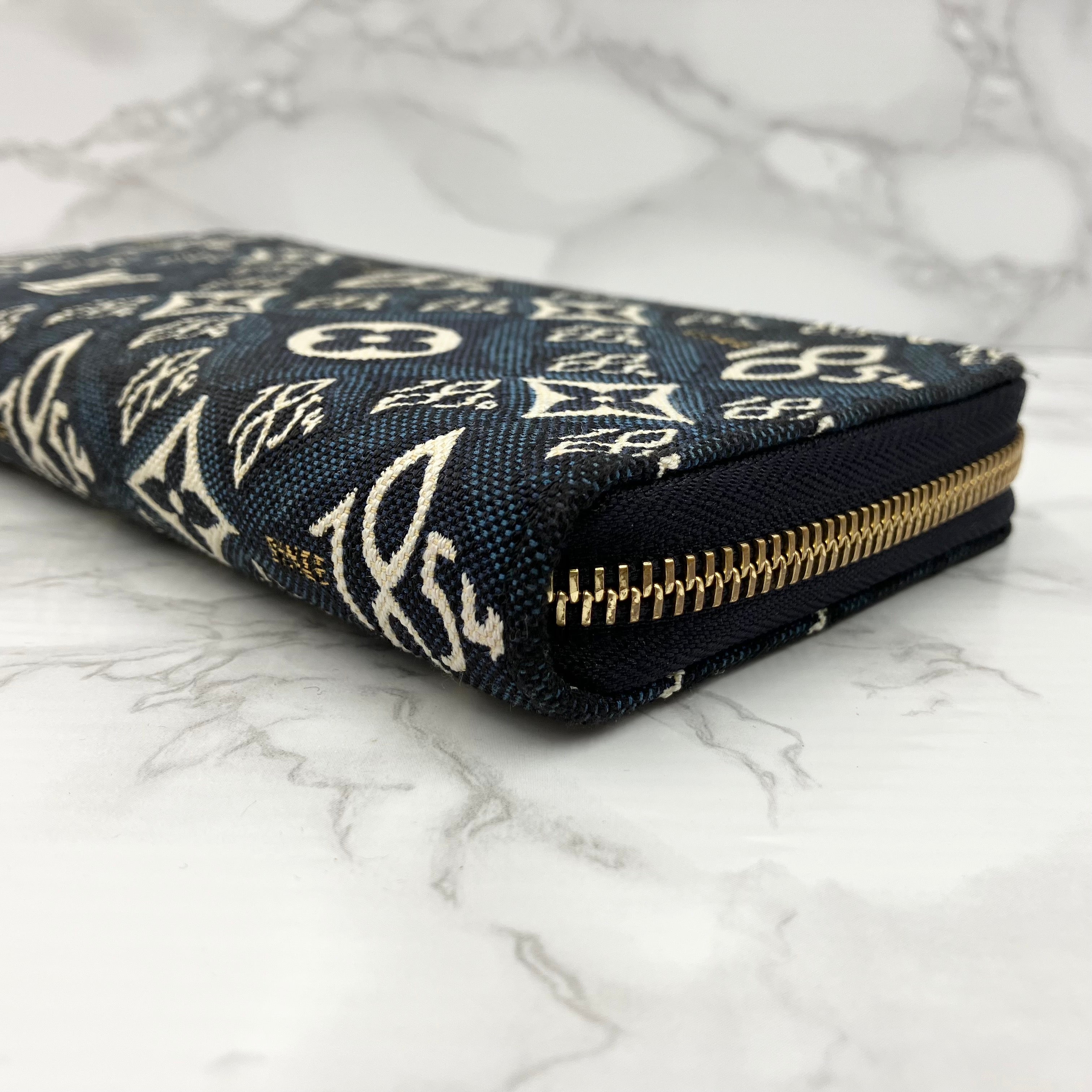 LOUIS VUITTON 1854 Zippy Wallet