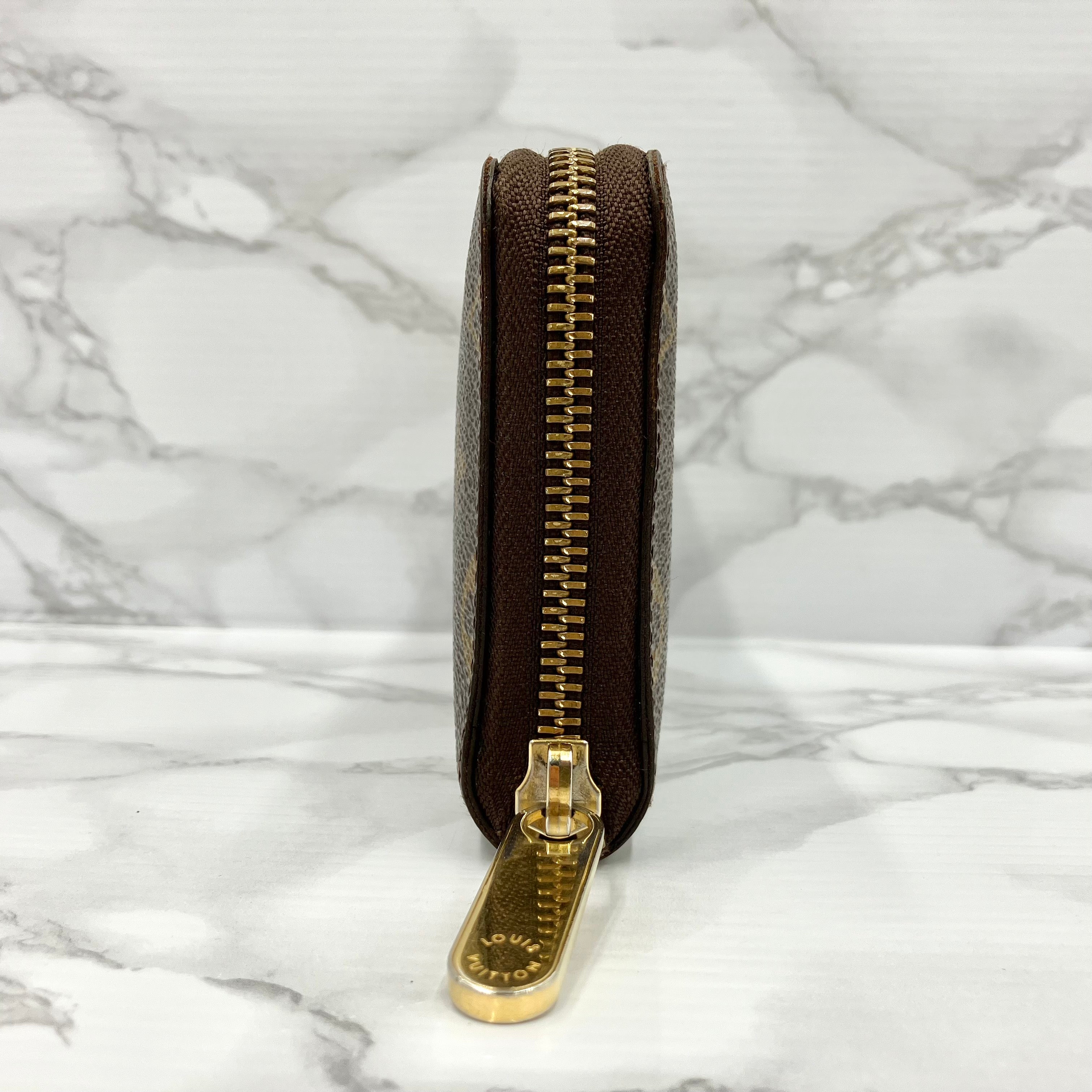 LOUIS VUITTON Monogram zippy compact