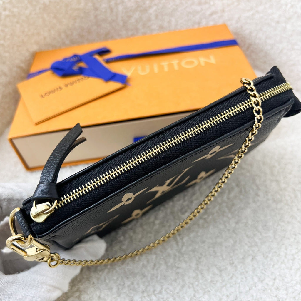 LV Mini Pochette Accessoires in Bicolor Black / Creme Empreinte Leather GHW