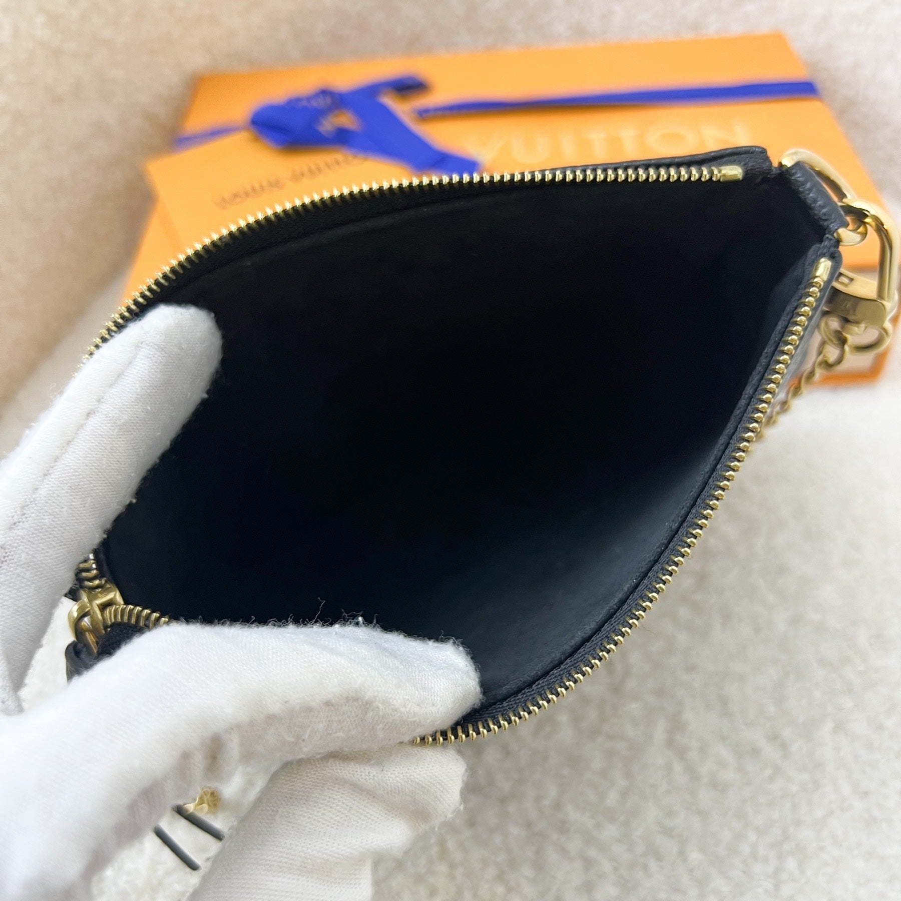 LV Mini Pochette Accessoires in Bicolor Black / Creme Empreinte Leather GHW