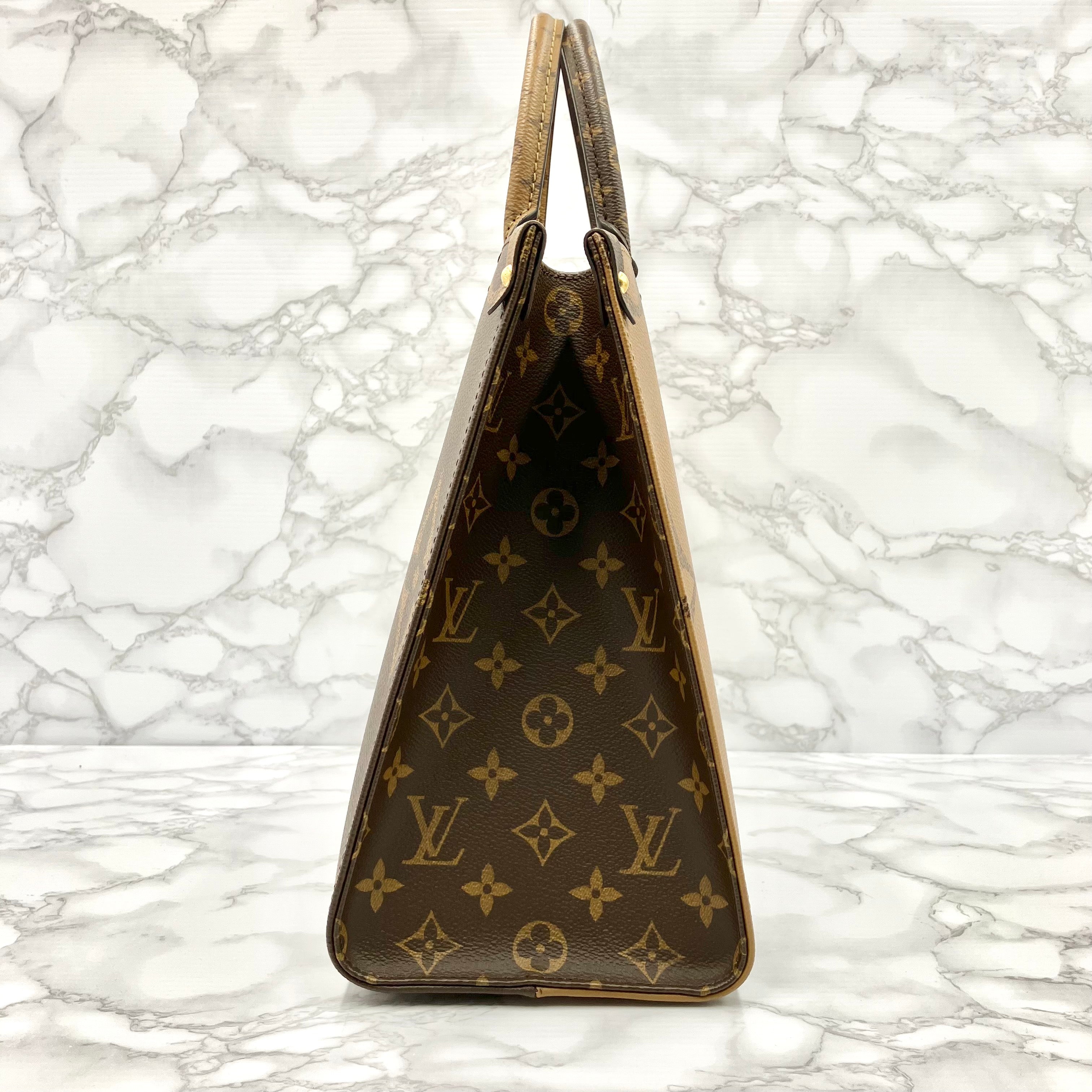 LOUIS VUITTON Monogram Giant Reverse On The Go MM