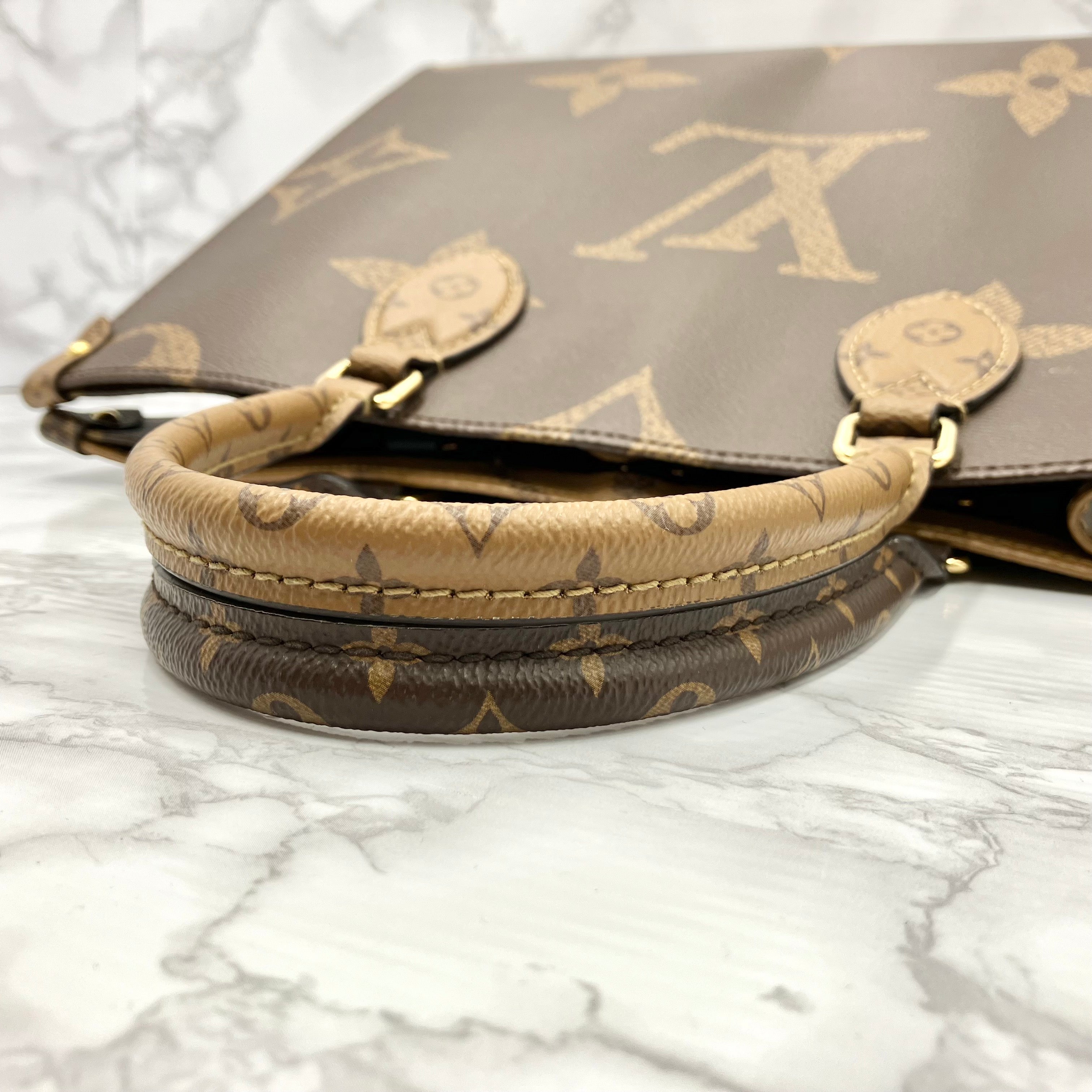 LOUIS VUITTON Monogram Giant Reverse On The Go MM