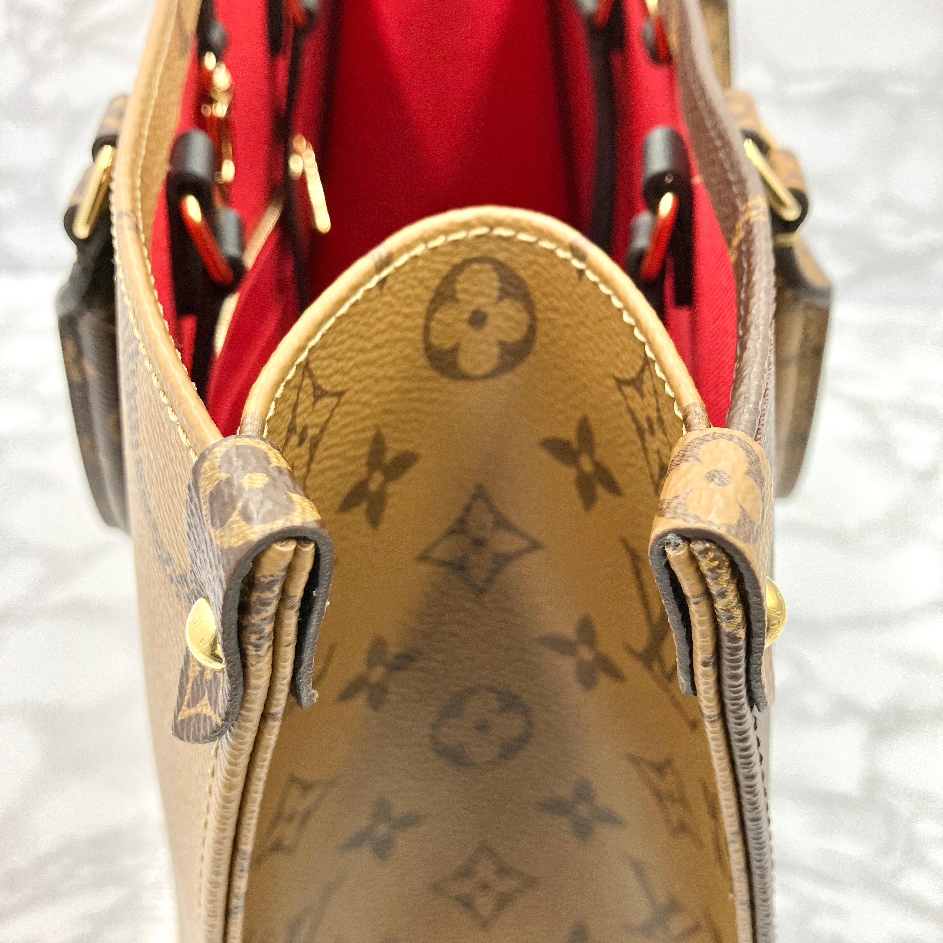 LOUIS VUITTON Monogram Giant Reverse On The Go MM