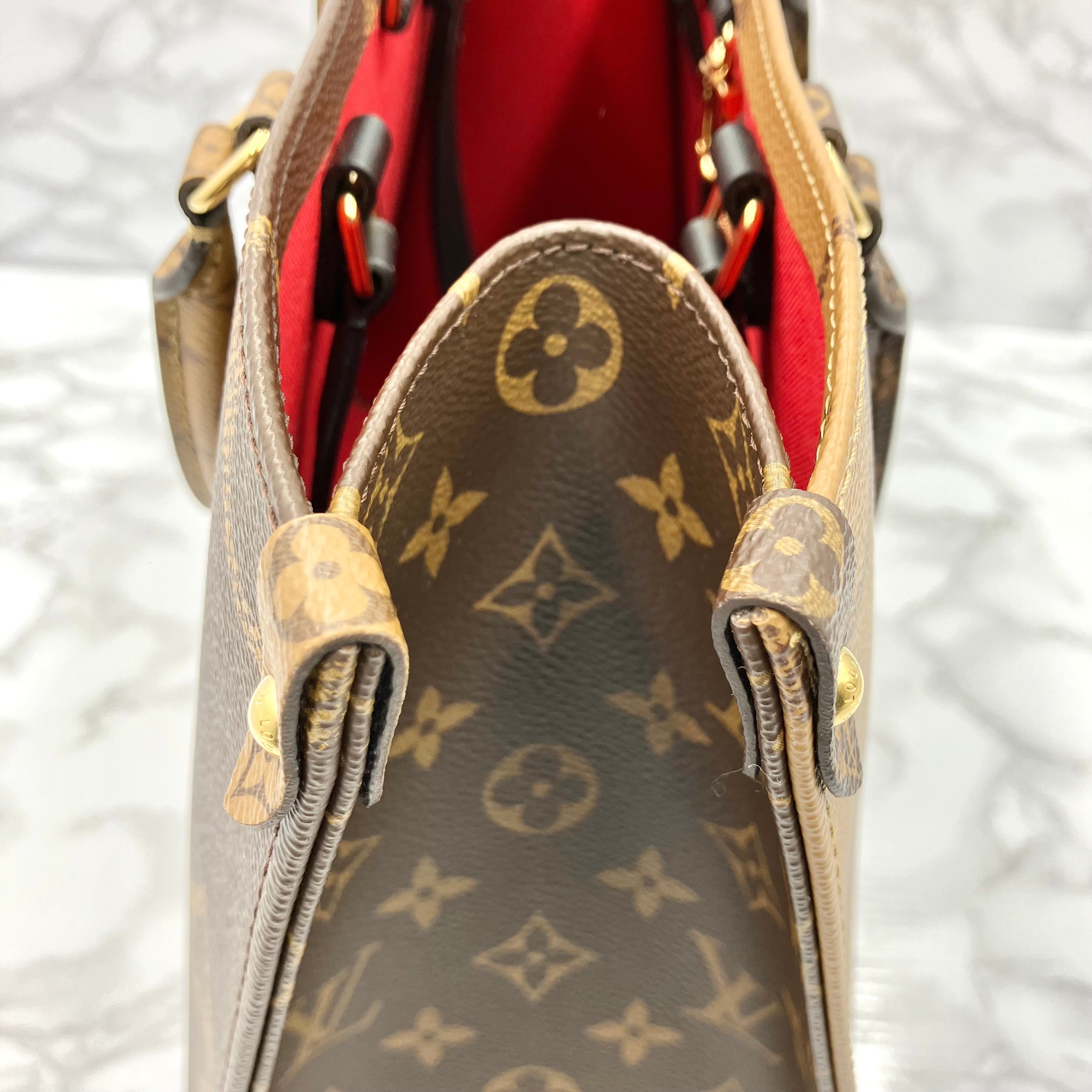 LOUIS VUITTON Monogram Giant Reverse On The Go MM