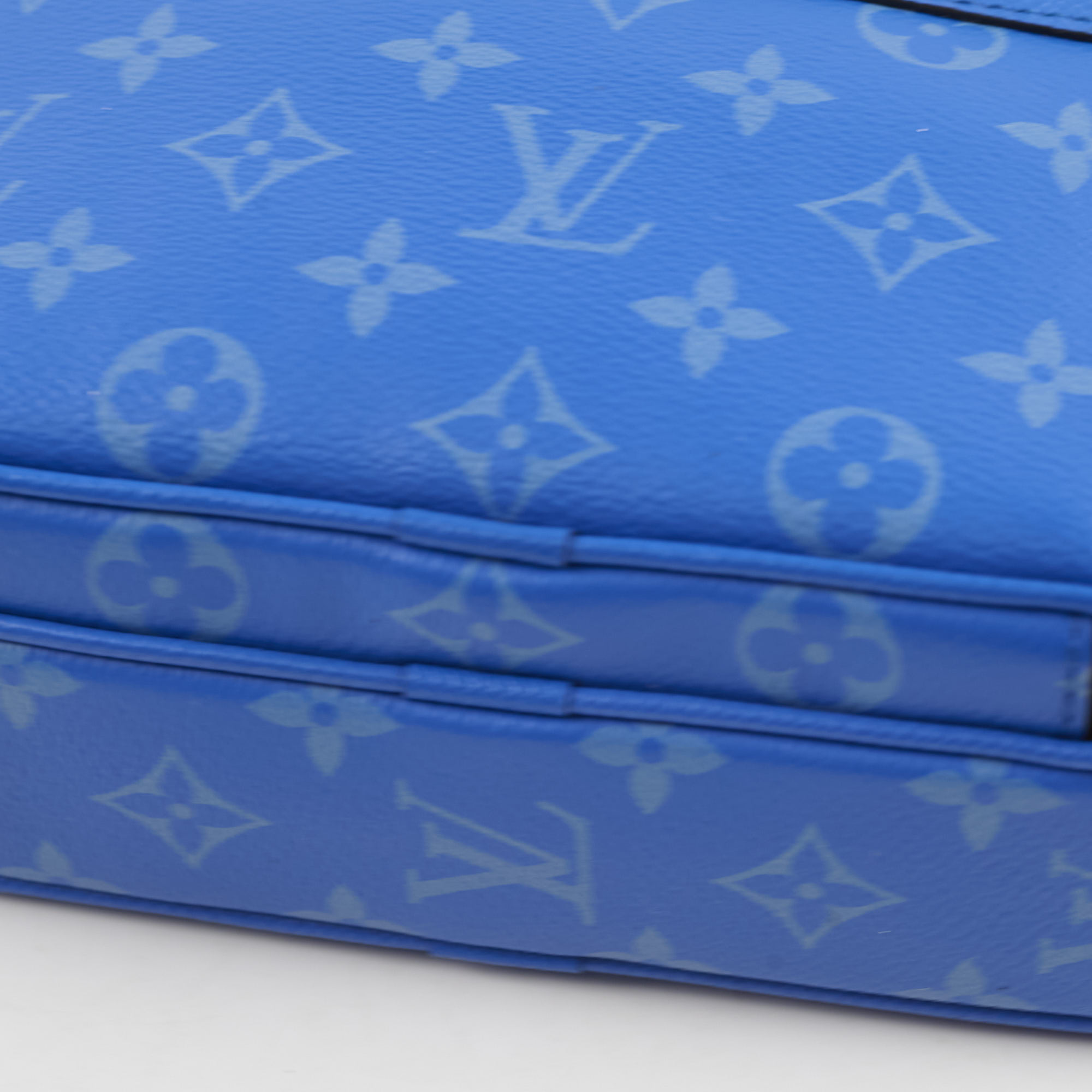 Louis Vuitton Taigarama Leather Messenger Bag Blue