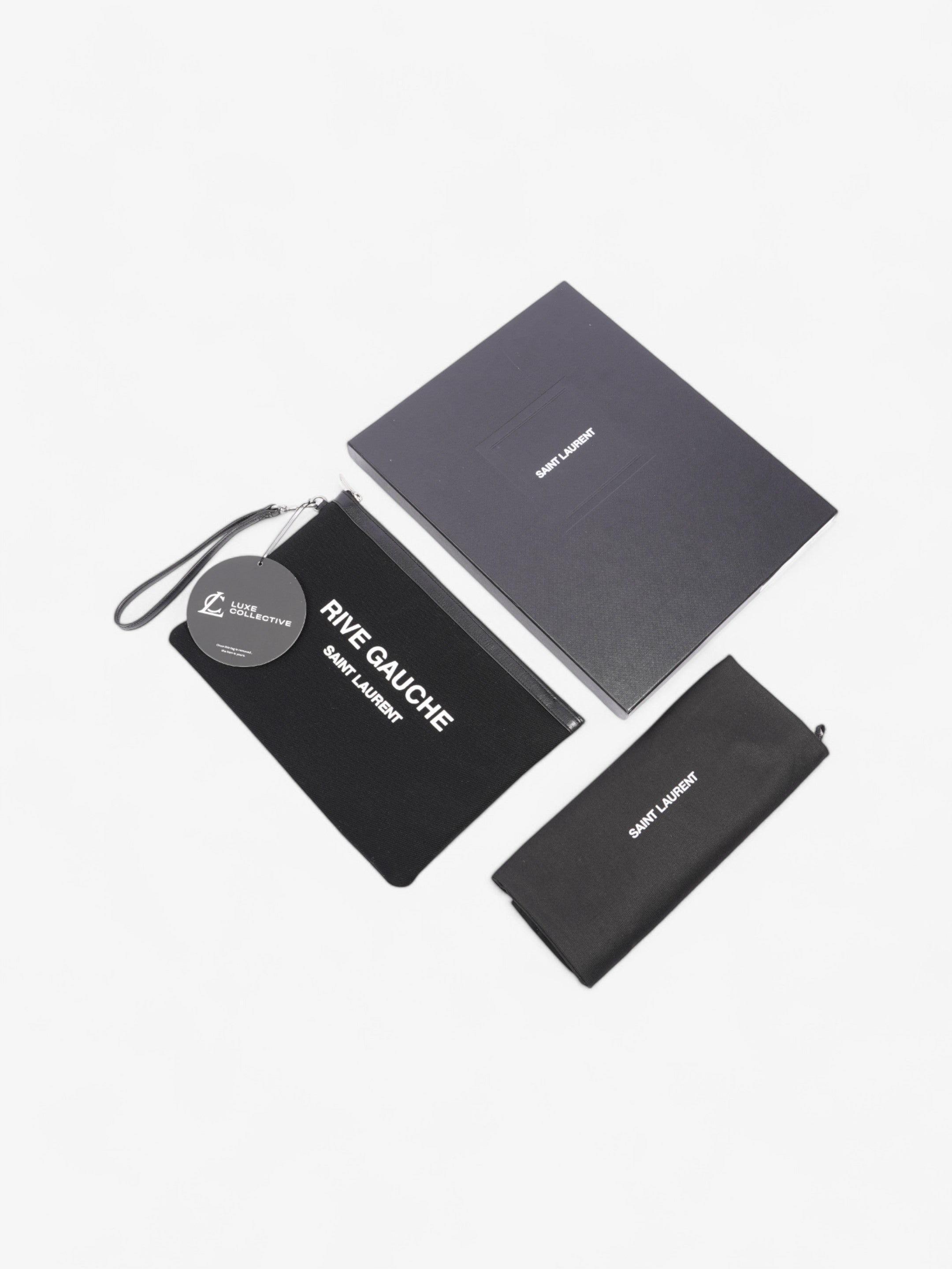 Saint Laurent Rive Gauche Wristlet Black / White Canvas