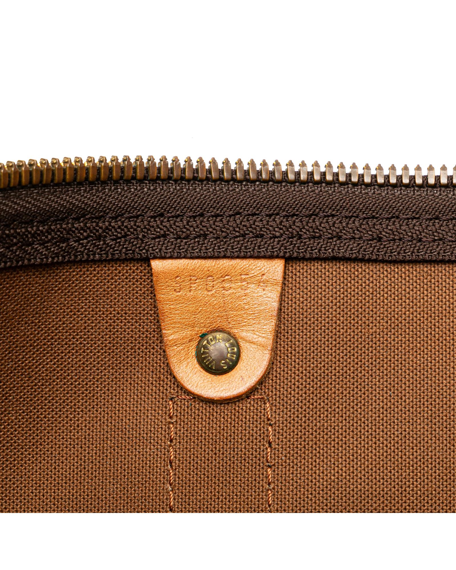 Monogram Canvas Keepall with Vachetta Leather Trim and Top Zip Closure
