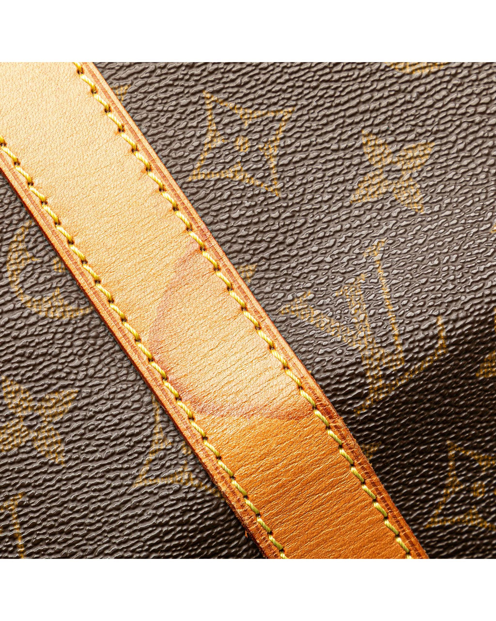 Monogram Canvas Keepall with Vachetta Leather Trim and Top Zip Closure